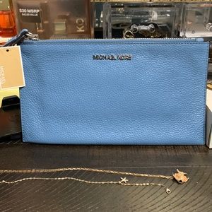 Michael Kors clutch in soft blue color, new with tags